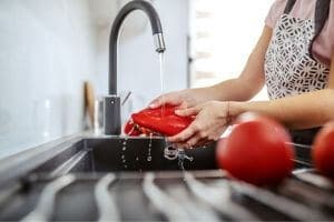 Washing Tomatoes in the Sink